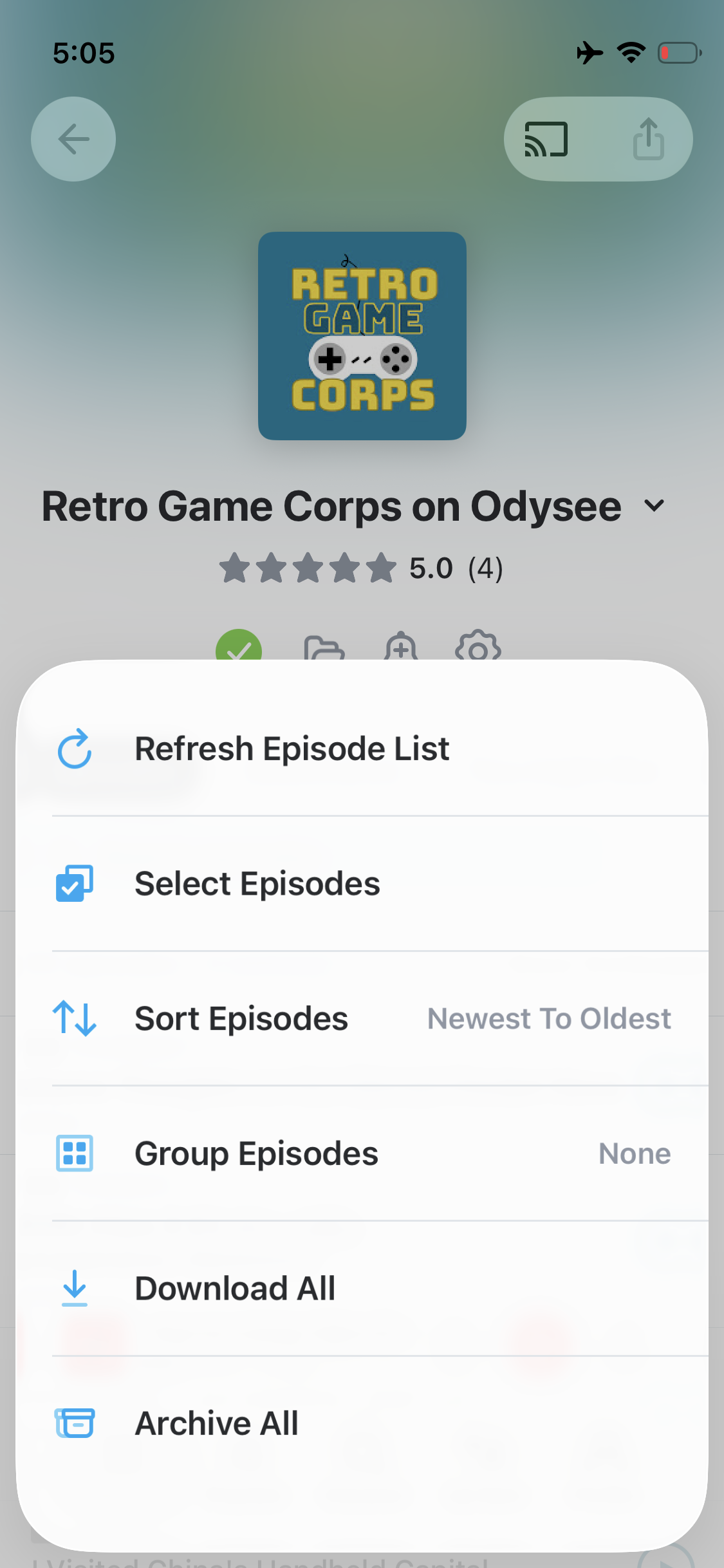 Pocket Casts podcast page on iOS with the episode-options menu open